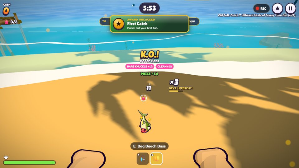 A Beach Bass knocked out on the sand by a pair of toon fists, with K.O. and combo bonuses popping up and a First Catch award.